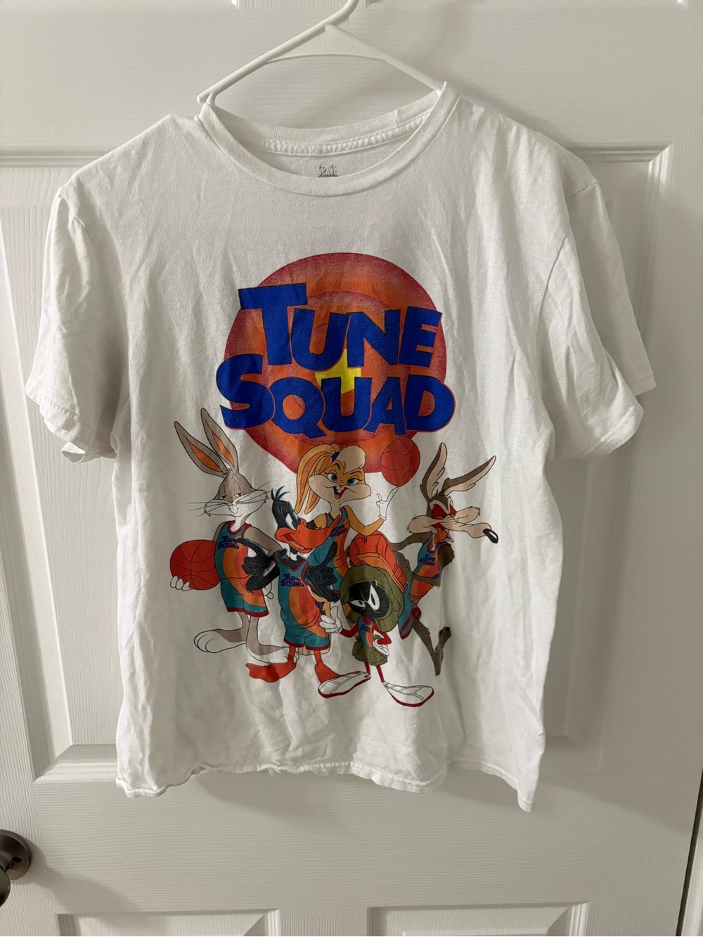 Legacy White Tune Squad Graphic Tee with Blue and Orange Print